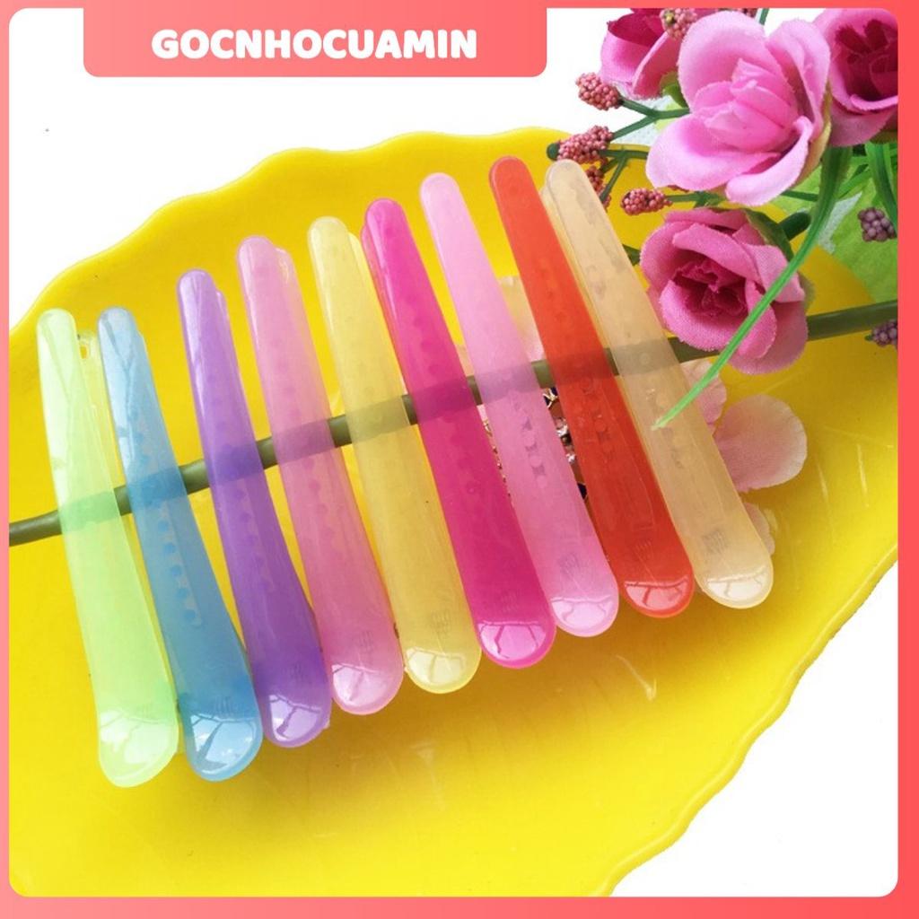 Kẹp tóc nhiều màu dùng để tạo kiểu cho nữ