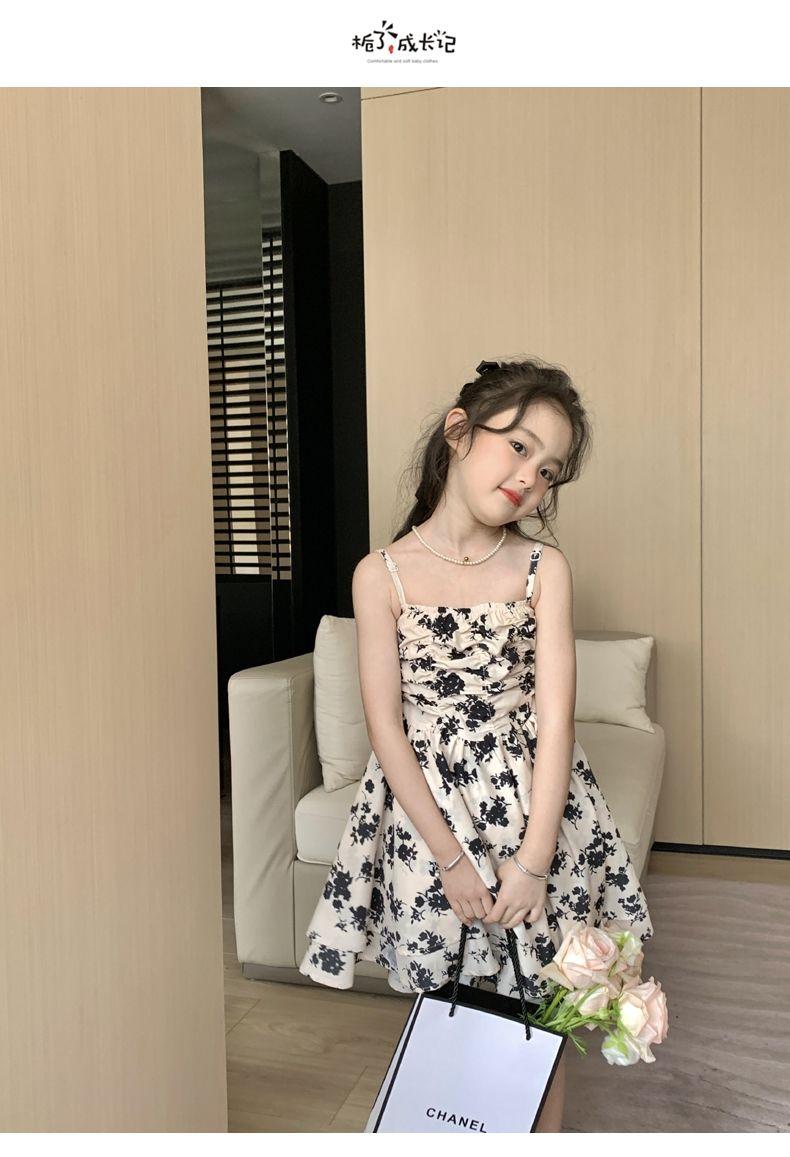 SHUANGYAN Yuanbaoth trẻ em ăn mặc thời trang phù hợp với phong cách phương Tây mùa xuân ăn mặc trẻ em gái mảnh hoa sling váy dệt kim áo choàng