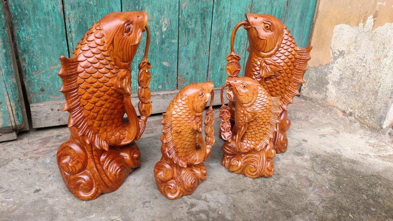 Cặp cá song ngư bằng gỗ hương đá kt cao 20×11×7cm