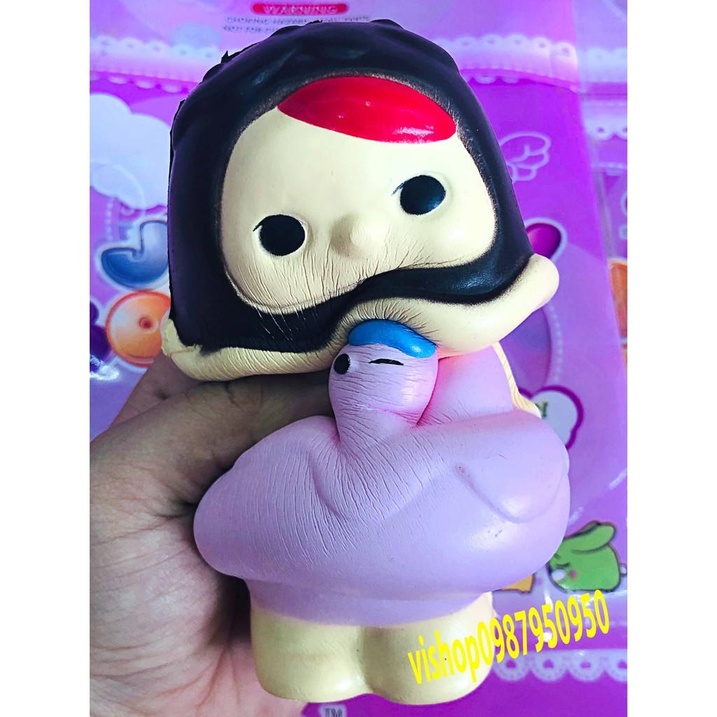 ĐỒ CHƠI SQUISHY  CÔ GÁI VỊT TÓC ĐEN VÁY TÍM