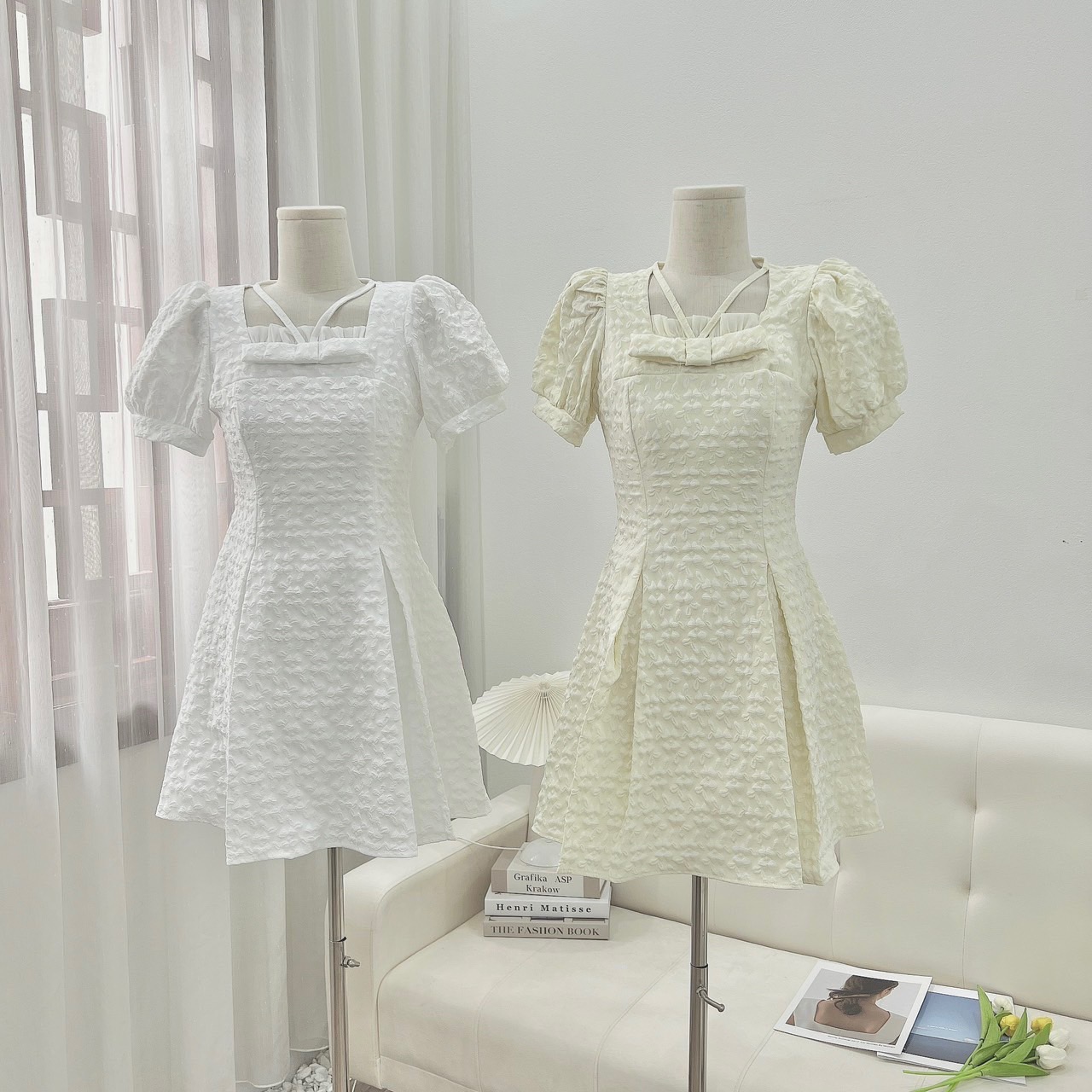 Đầm gấm nơ ngực đan dây chéo