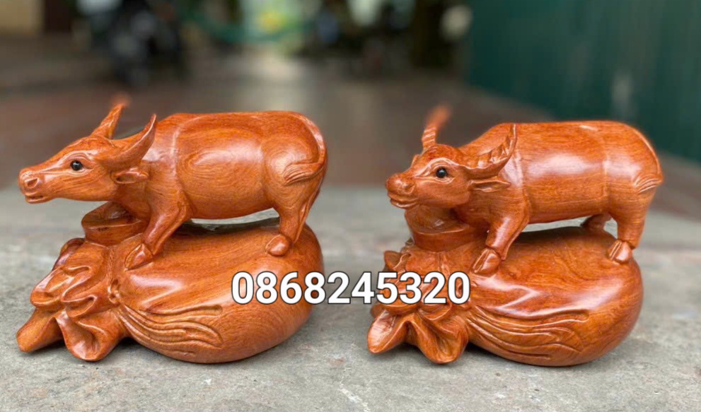 TƯỢNG CON TRÂU PHONG THỦY BẰNG GỖ HƯƠNG ĐÁ KT 20×15×15CM