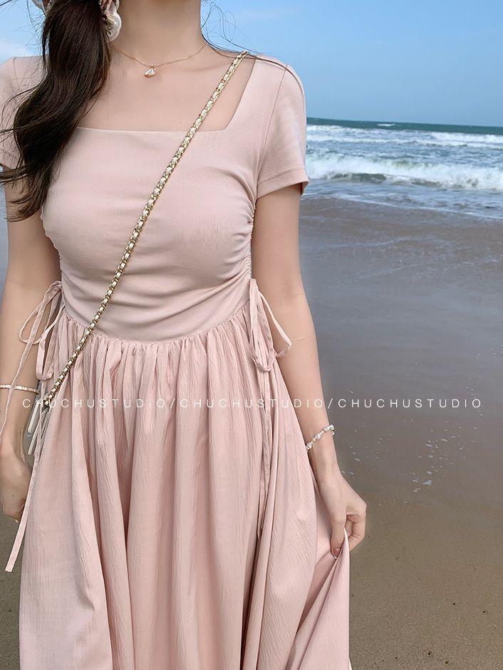 DONGSHOP Mùa xuân màu hồng Pháp ăn mặc nữ 2023 khí chất hiển thị gầy váy dài cao cấp Hepburn phong cách váy
