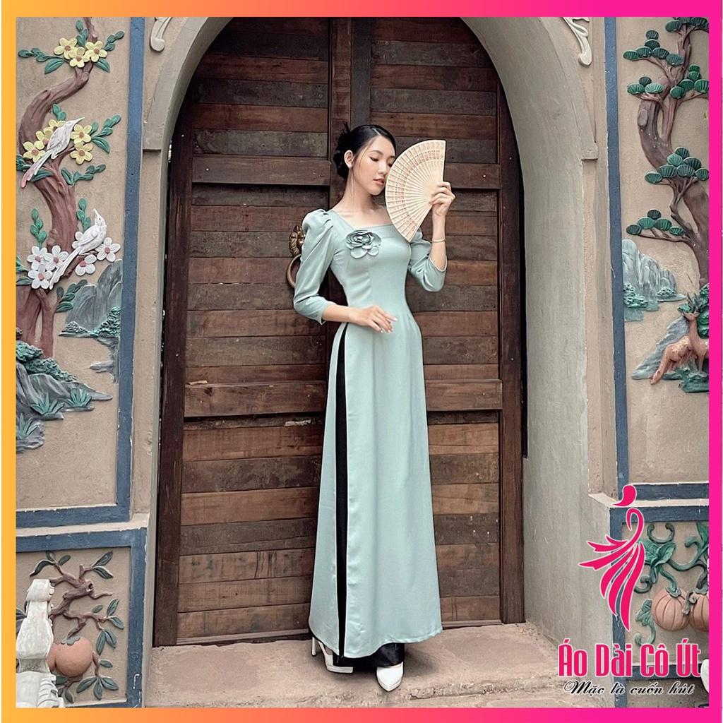 Áo dài nữ lụa tây thi cổ vuông tay bồng ngọc đính hoa