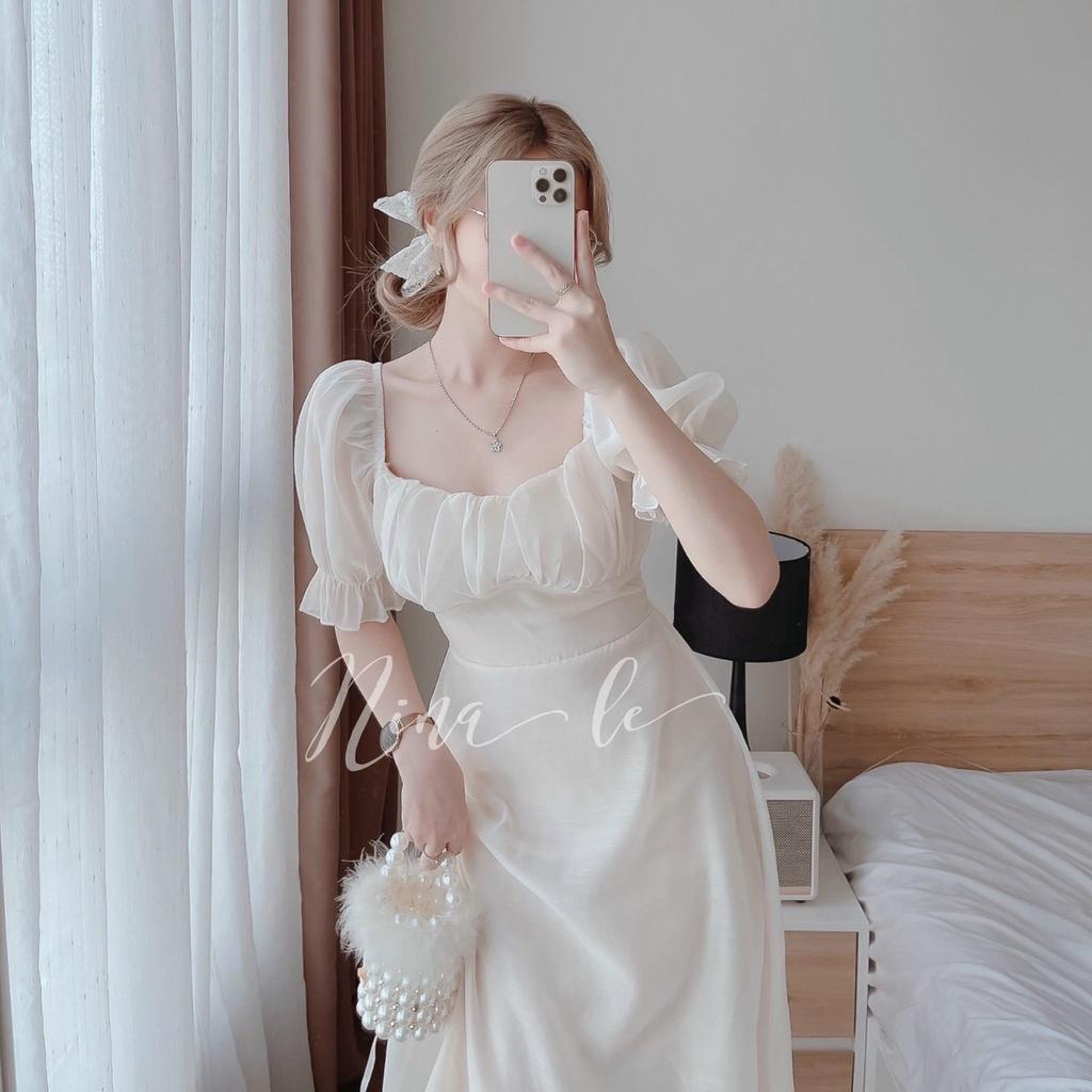 Đầm trắng xoè tiểu thư cổ vuông tay phồng xếp ly ngực