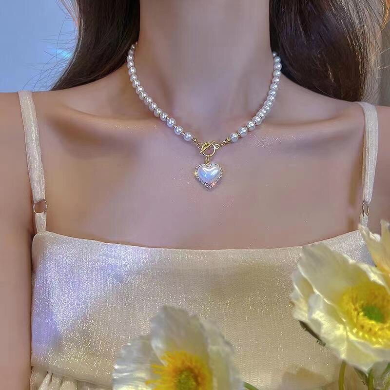 Vòng Cổ Choker Đính Hạt Ngọc Mặt Hình Trái Tim Thời Trang Sang Chảnh