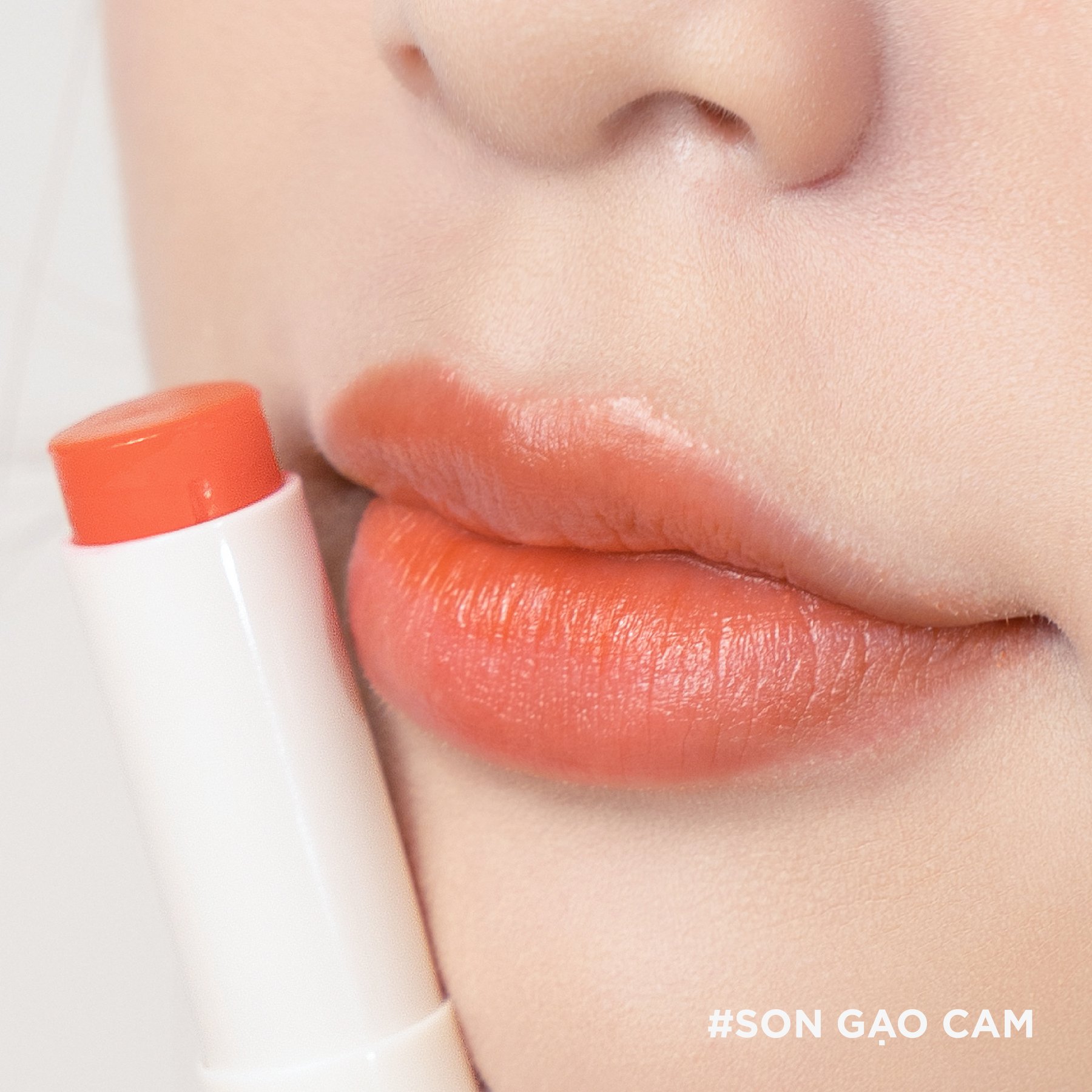 Son Dưỡng Môi Gạo Hương Cam Có Màu Phớt Cam Nhẹ Dưỡng Môi Hết Khô Nẻ An Toàn Từ Thiên Nhiên Cỏ Mềm 3.8g