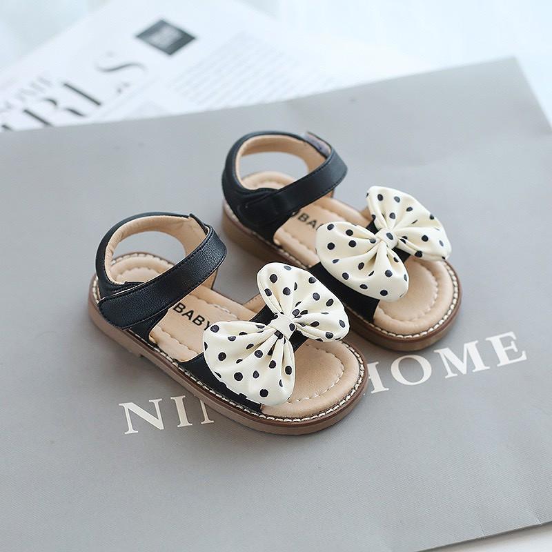 Dép Sandal trẻ em MG Nơ chấm bi baby màu đen cho bé gái từ 1 đến 5 tuổi