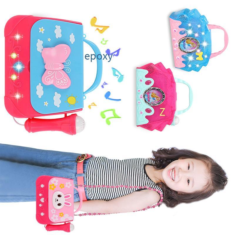 Phong cách mới nhất của trẻ em trí thông minh âm nhạc phim hoạt hình ba lô đồ chơi giáo dục sớm với micrô micrô âm nhạc ánh sáng lưu trữ túi cô gái
