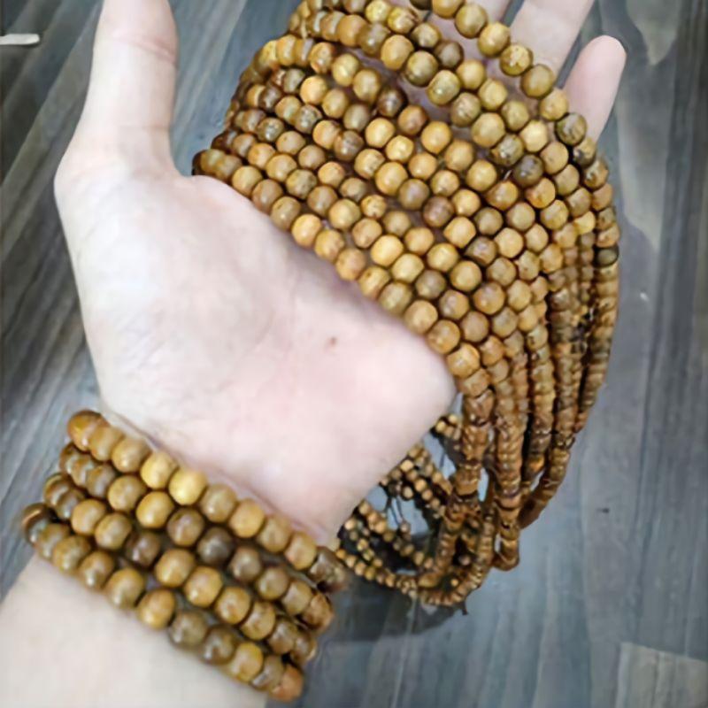 Vòng tay hoa sen nữ chuỗi hạt 5 ly gỗ thơm bach màu tự nhiên