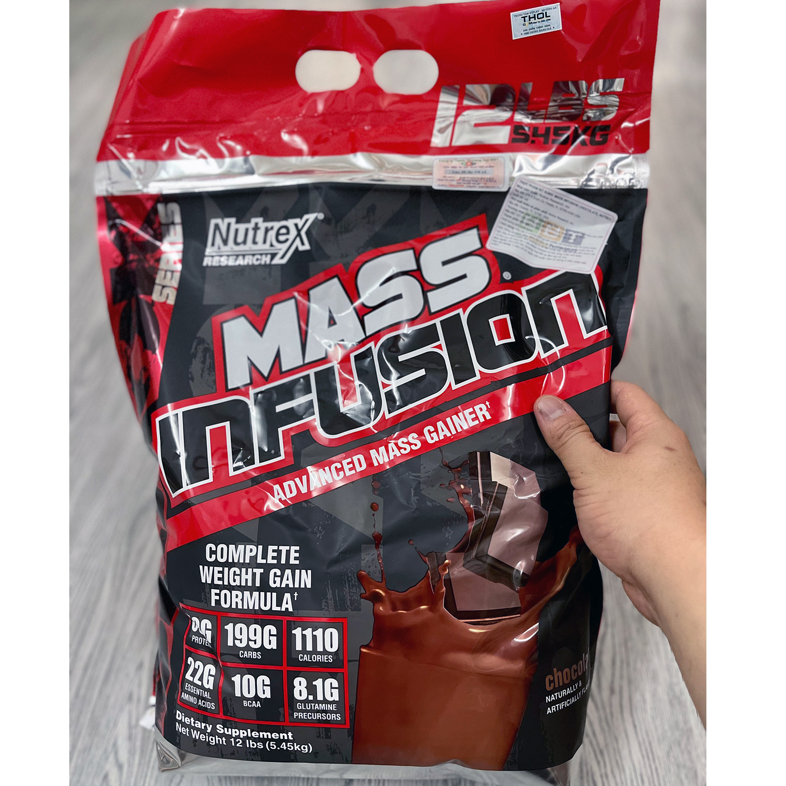 Combo Sữa tăng cân tăng cơ Mass Infusion của Nutrex hương Chocolate bịch lớn 5.45 kg hỗ trợ tăng cân, tăng cơ cho người gầy kén ăn, khó hấp thụ thức ăn tự nhiên & Áo Gym Đen size S (47kg-57kg)