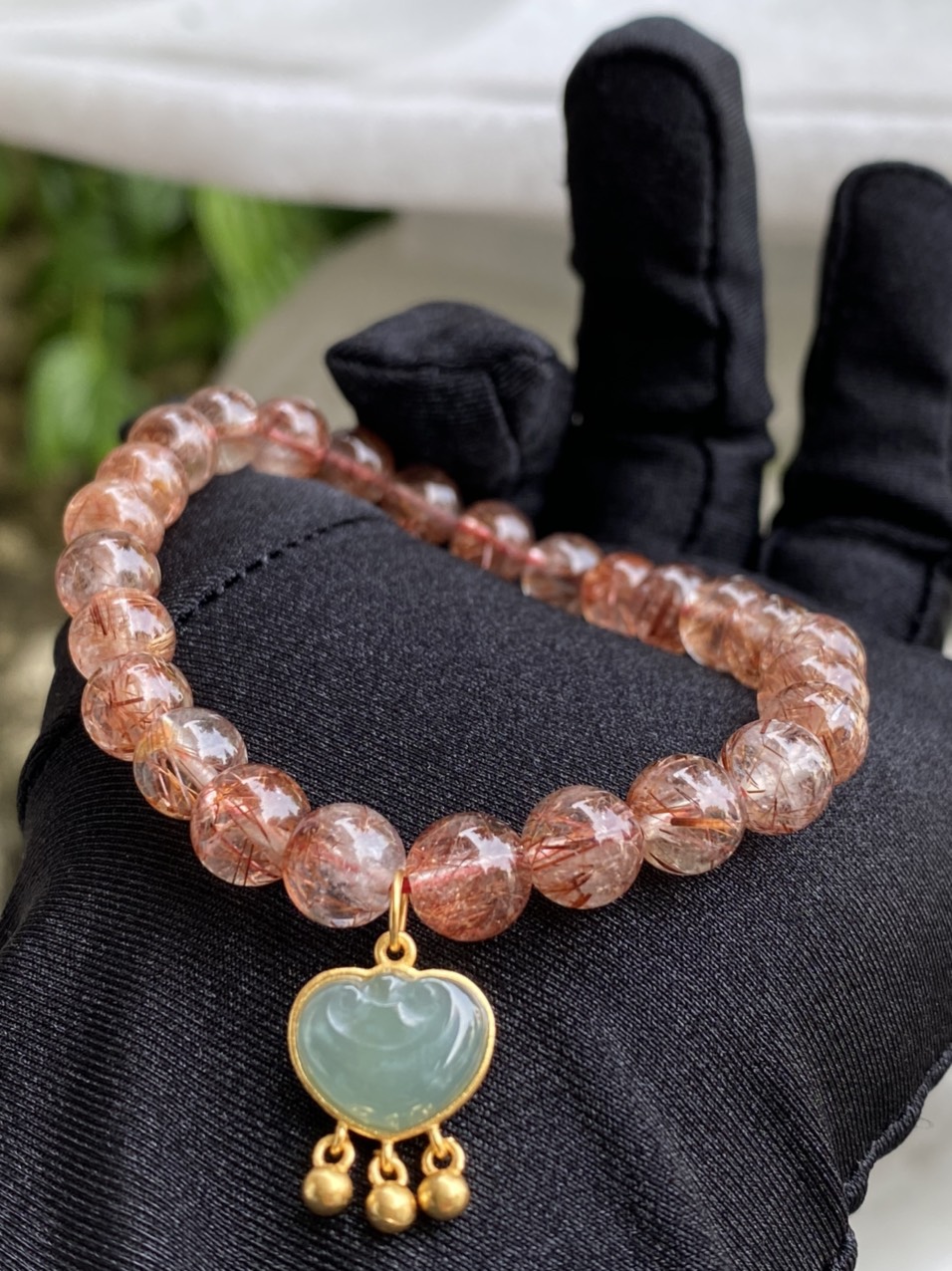 Vòng đá đá Thạch anh tóc đỏ mix charm Ngọc Phỉ Thuý hình Khánh như ý cát tường