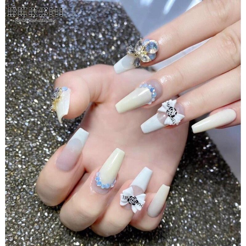 Nơ bột nail, nơ nhựa nail 1 túi 17-20 viên - beeshi shop nail