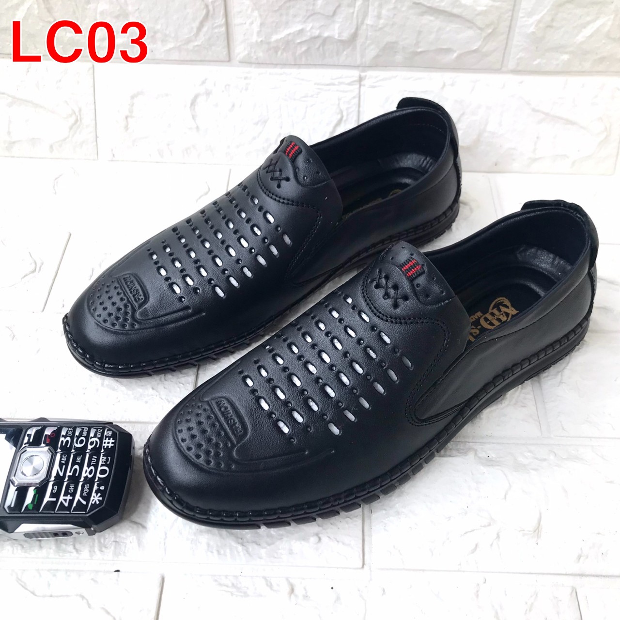 Giày lười nam da bò thật..đế cao su mềm..màu đen..mã LC03.. có lổ tản nhiệt.. mẫu mới nhất hiện nay