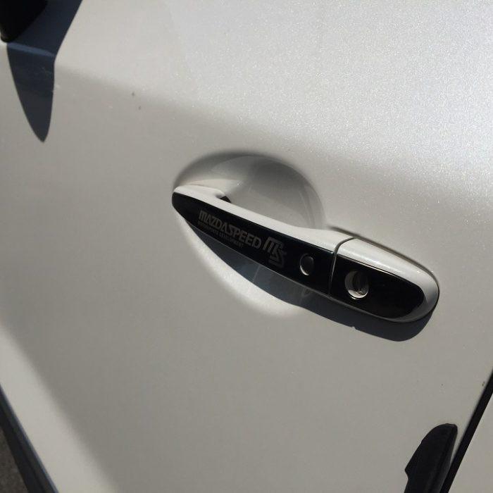 Bộ ốp tay nắm cửa xe Mazda CX5, CX-5 vân Titan - Tặng miếng dán trong suốt chống xước hõm cửa
