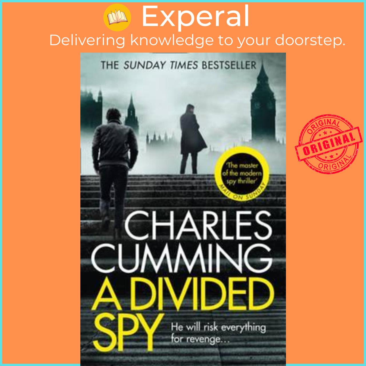 Sách - A Divided Spy: A Gripping Espionage Thriller from the Master of the Mo by CHARLES CUMMING (UK edition, paperback)