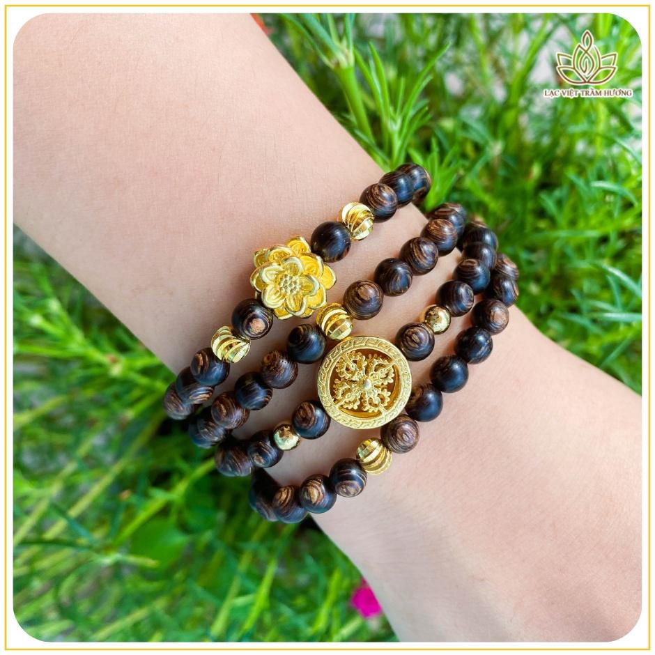 Vòng Tay Trầm Hương 108 Hạt Sánh Chìm Mix Charm Hoa Sen Vàng Phú Quý và Bánh Xe Pháp Luân Vàng - Lạc Việt Trầm Hương