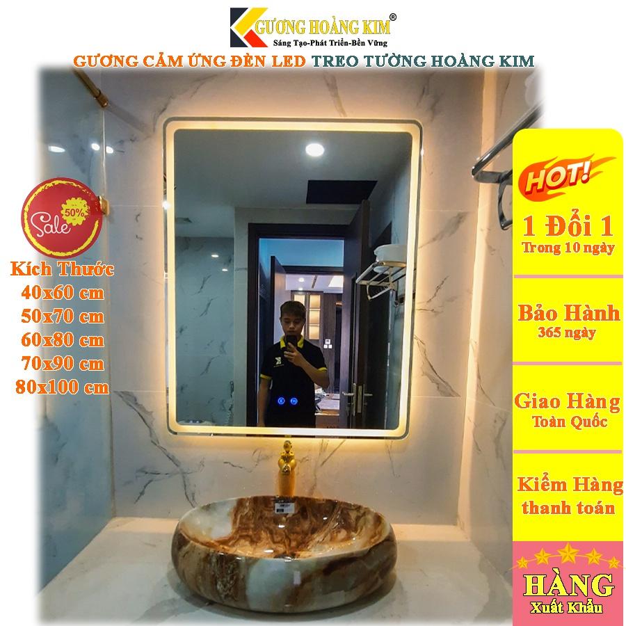 Gương nhà tắm cảm ứng đèn led thông minh treo tường chữ nhật trang điểm kích thước 40x60cm mã HK-3001