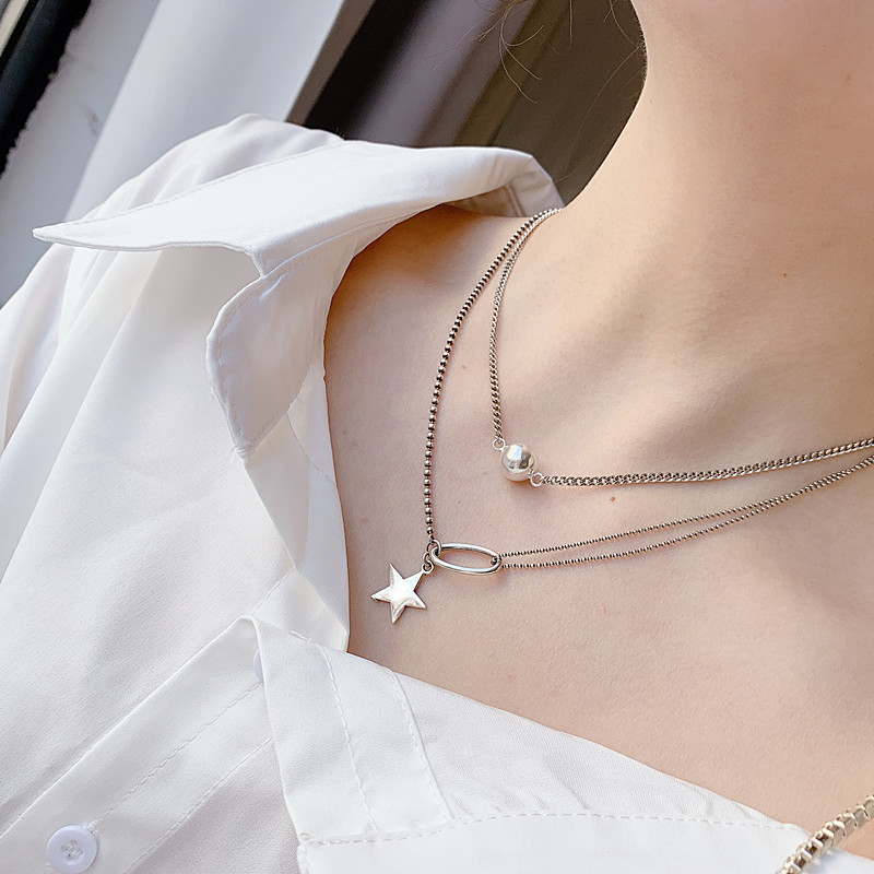 Vòng cổ titan không đen mix sao sành điệu