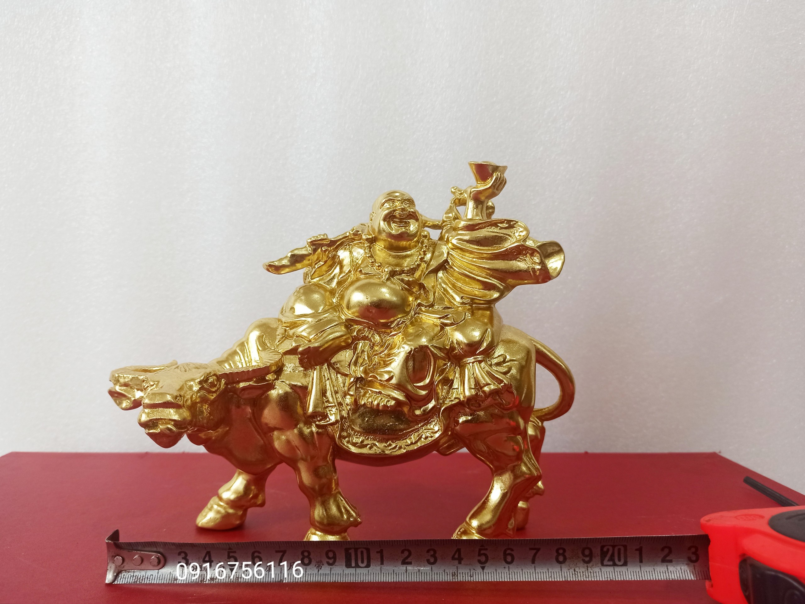 Di lặc dát vàng di lặc cưỡi trâu bằng đồng thau dát vàng tượng thần tài cưỡi trâu đồng thau dát vàng tài lộc hàng VIP