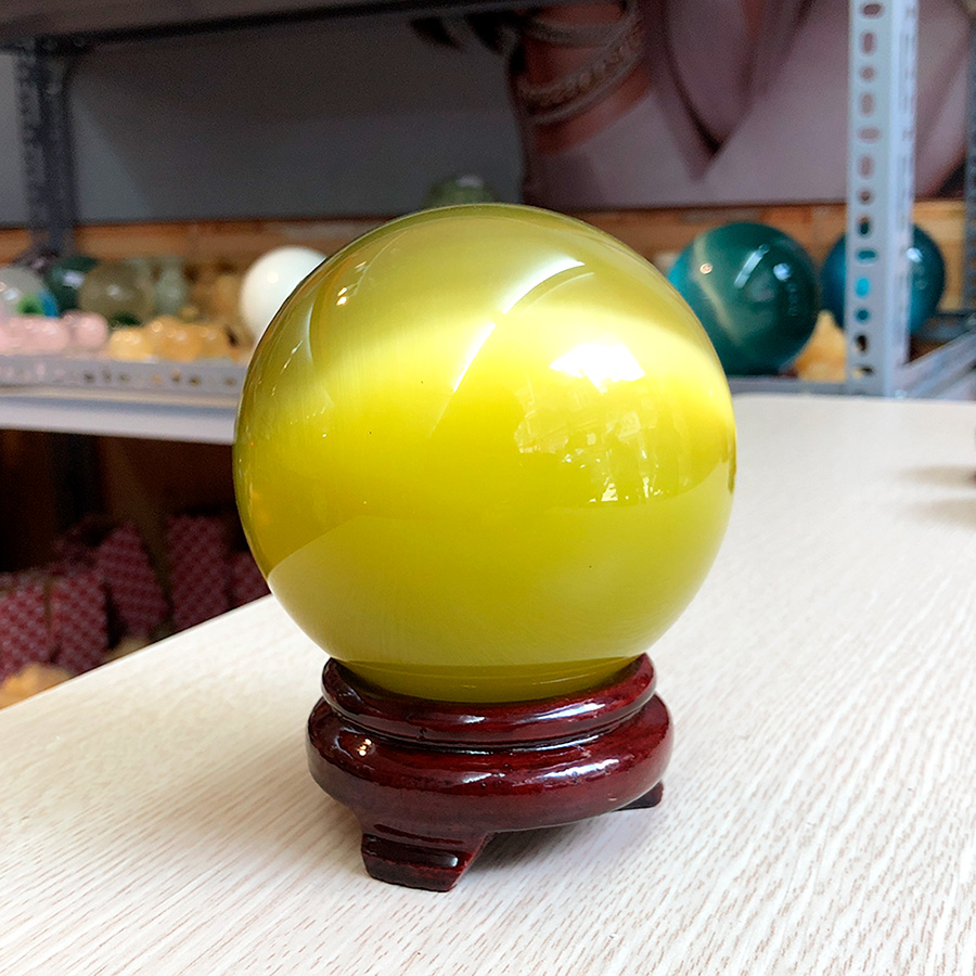 Quả Cầu Phong Thủy Pha Lê Mắt Mèo Vàng