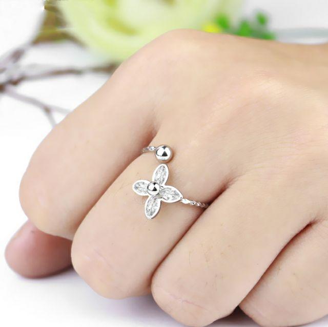 Nhẫn nữ inox hoa mai free size