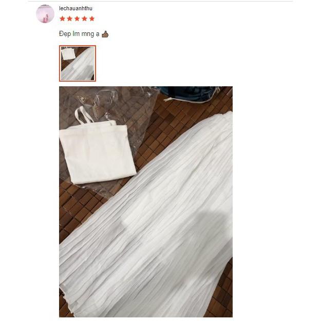 Chân váy xếp ly trắng dài midi