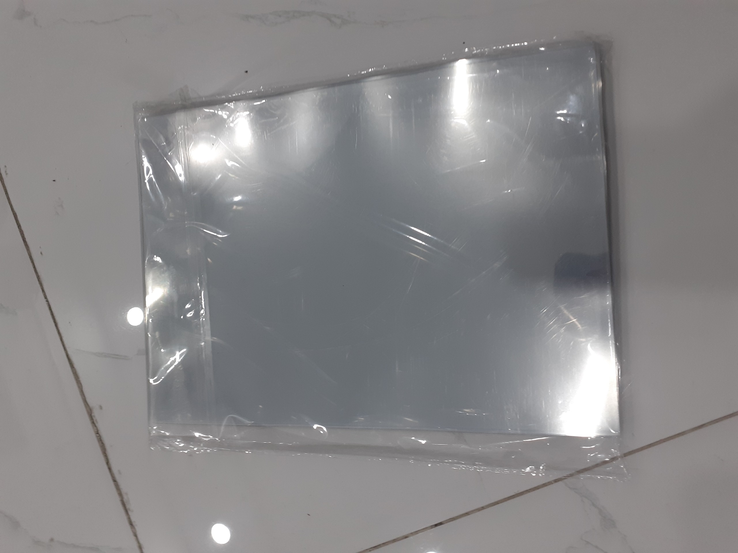 1 xấp bìa kiếng A4 1,5
