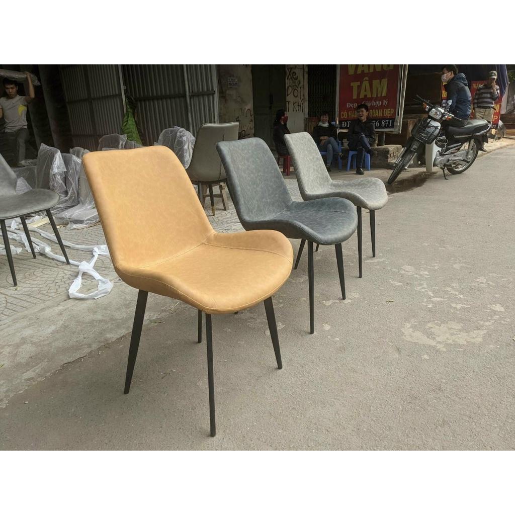 Bộ bàn ăn mặt đá ceramic bóng chân X cong kết hợp cùng ghế Nelson