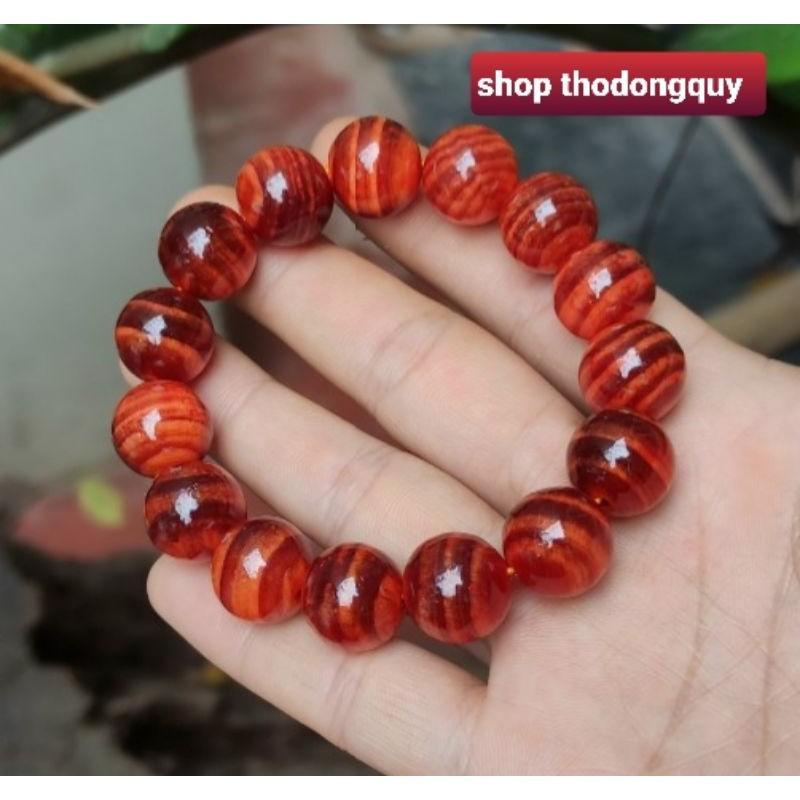 Vòng tay nam gỗ huyết long hạt tròn 14 m m