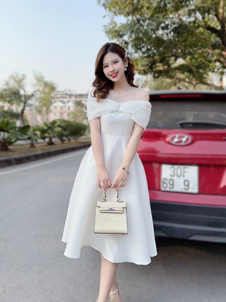 Đầm xòe nơ trễ vai phối lưới