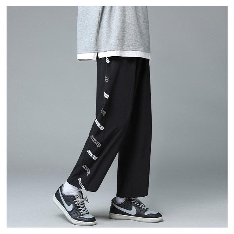 Quần jogger unisex ́ ̉ ̣̂ Quần ống rộng có dây rút ở gấu chất Umi thể thao, chất lì không xù