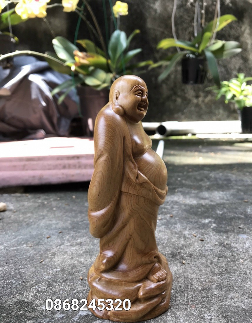 Tượng phật di lặc kéo bao vàng bằng gỗ bách xanh thơm nức kt cao 15×8.8×6cm