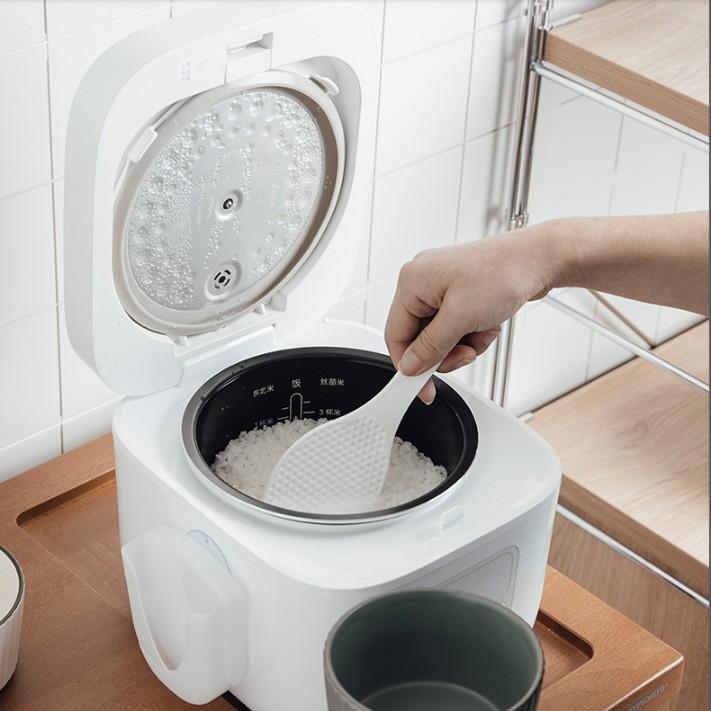 Muôi xới cơm kèm giá đựng hít chân không hàng Nhật
