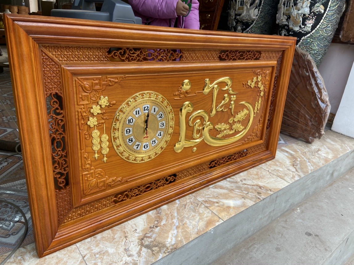 Tranh đồng hồ treo tường trạm khắc chữ tài lộc bằng gỗ gỗ đỏ kt 67×127×4.5cm