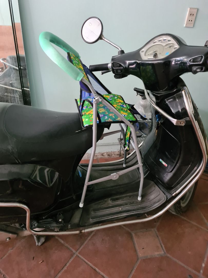 GHẾ ĐI CHUNG XE MÁY TAY GA GRANDE CHO BÉ