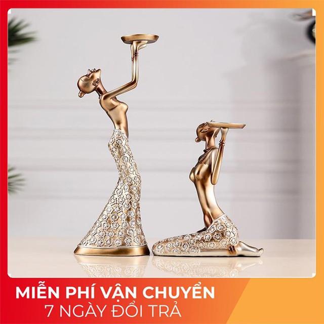 Tượng Bộ cô gái bê đĩa