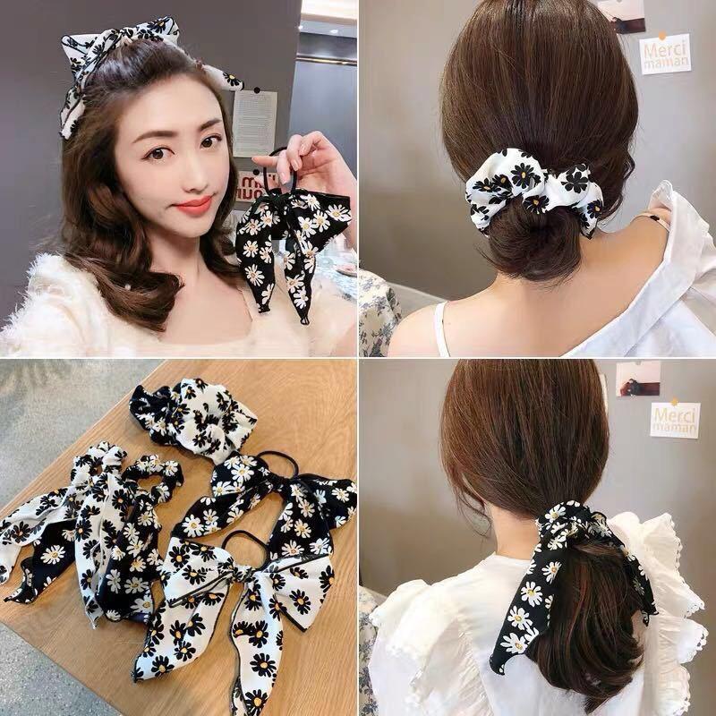 Cột tóc nơ hoa cúc dài tiểu thư sang trọng Tatitava