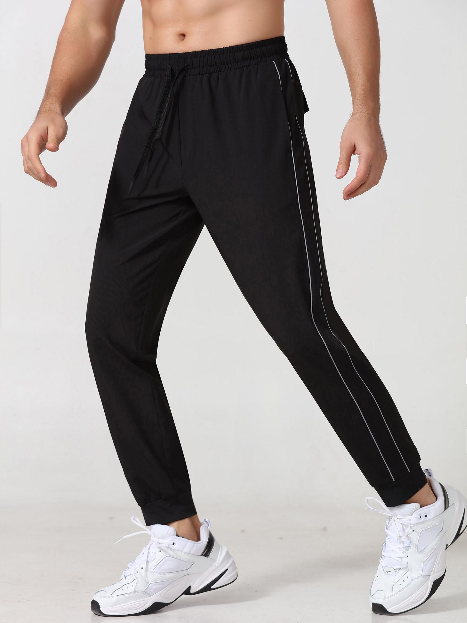 Quần Jogger Nam Quần thể thao có túi có dây phản quang Chạy bộ tập thể thao Người chạy bộ thể thao