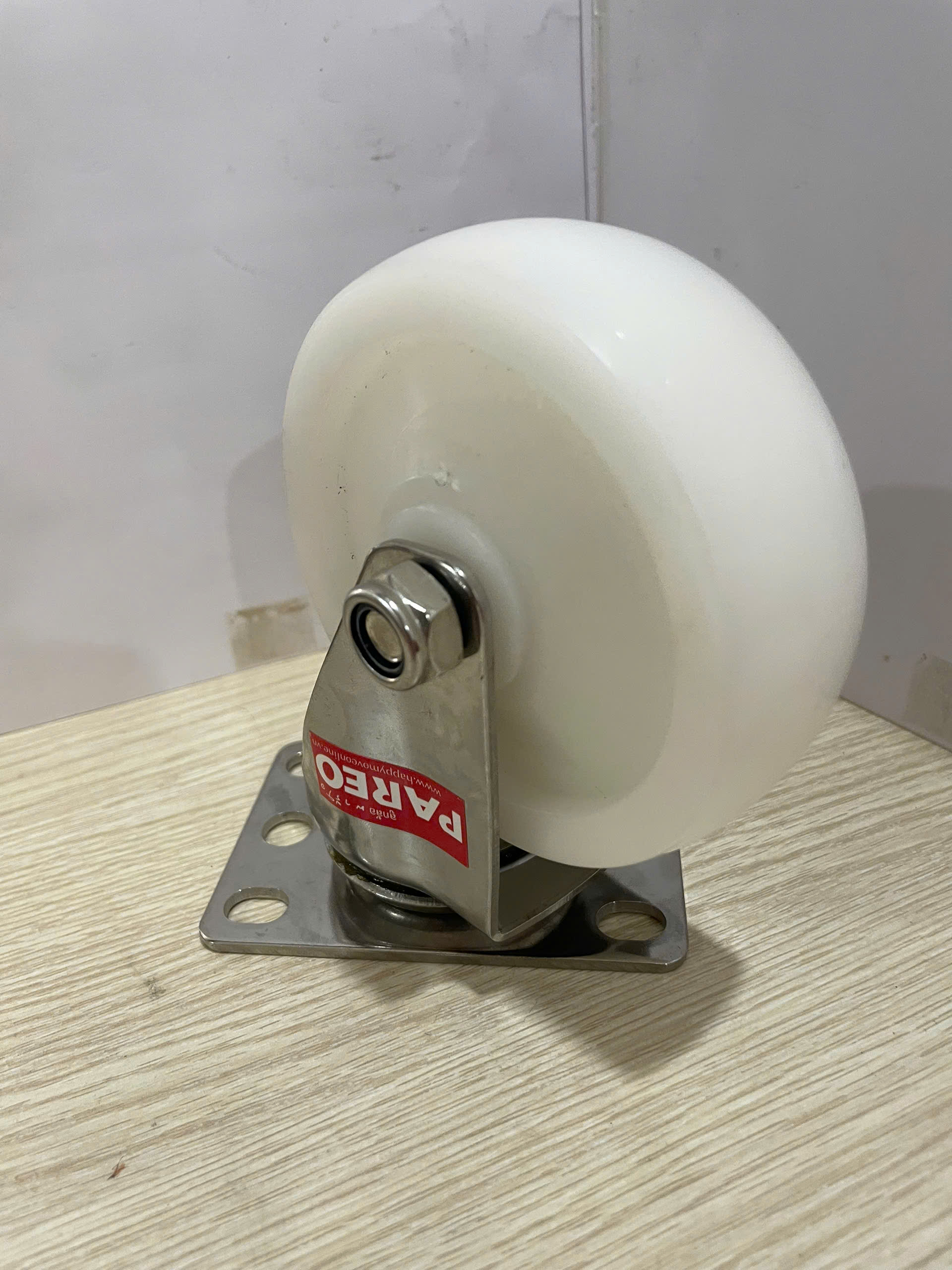 Bánh xe đẩy Nylon càng Inox 304 xoay 100x32mm - PAREO