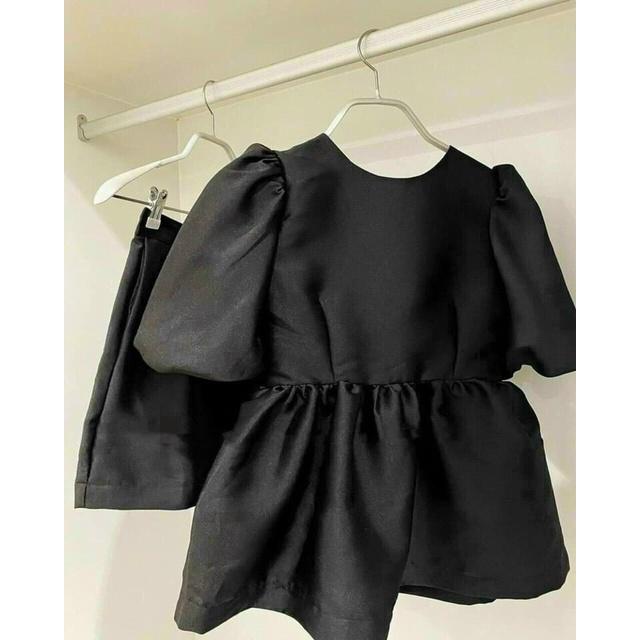 Set áo babydoll đen cột nơ lưng kem phối quần shorts