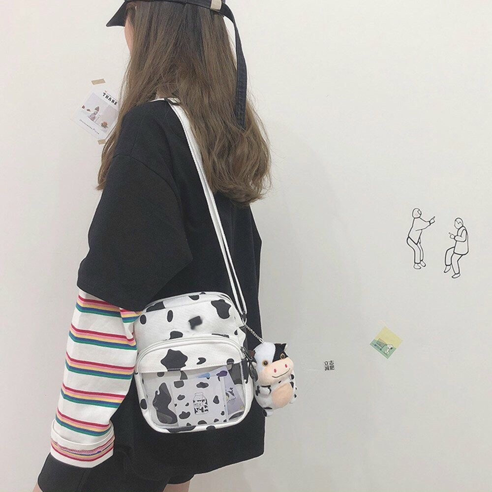 Túi đeo chéo mini con bò sữa có ngăn trong suốt không kèm móc khóa