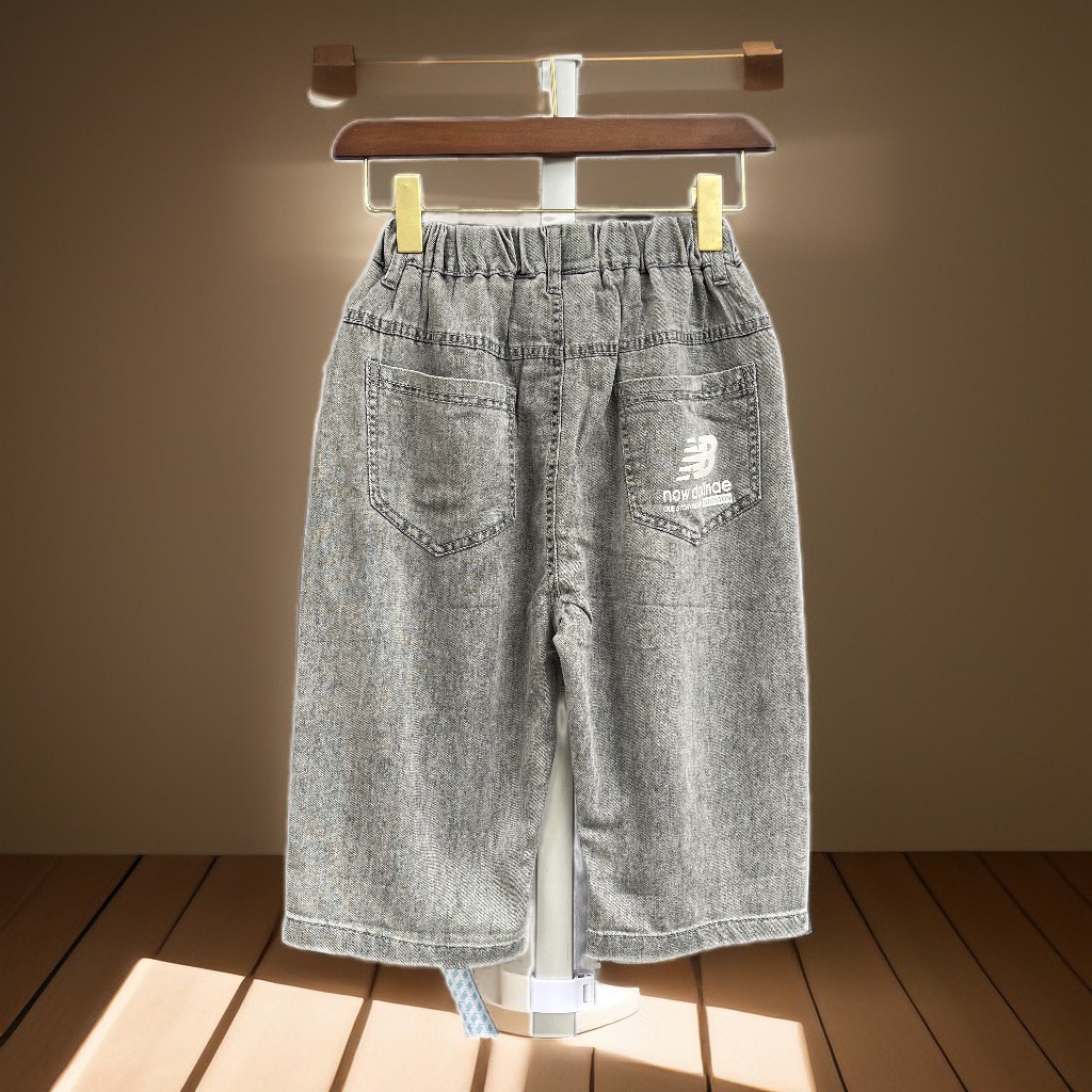 Quần bò bé trai lửng size đại, Quần jean trẻ em 10-16 tuổi in chữ NB vải mềm mại khỏe khắn thời trang