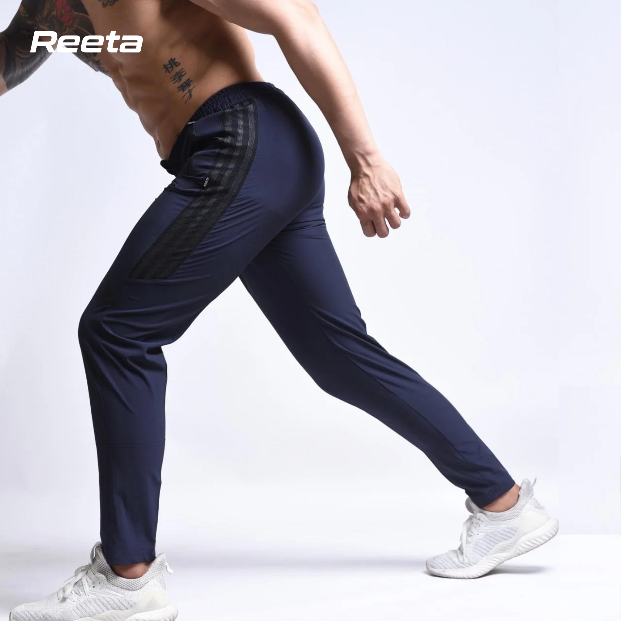Quần dài thể thao nam REETA, chất vải gió mềm mịn, phối lưới phần hông trẻ trung thể hiện phong cách mạnh mẽ - A1482