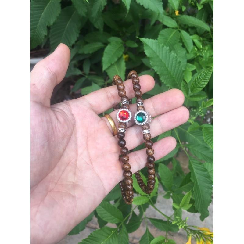 Vòng tay trầm hương mix charm đá.