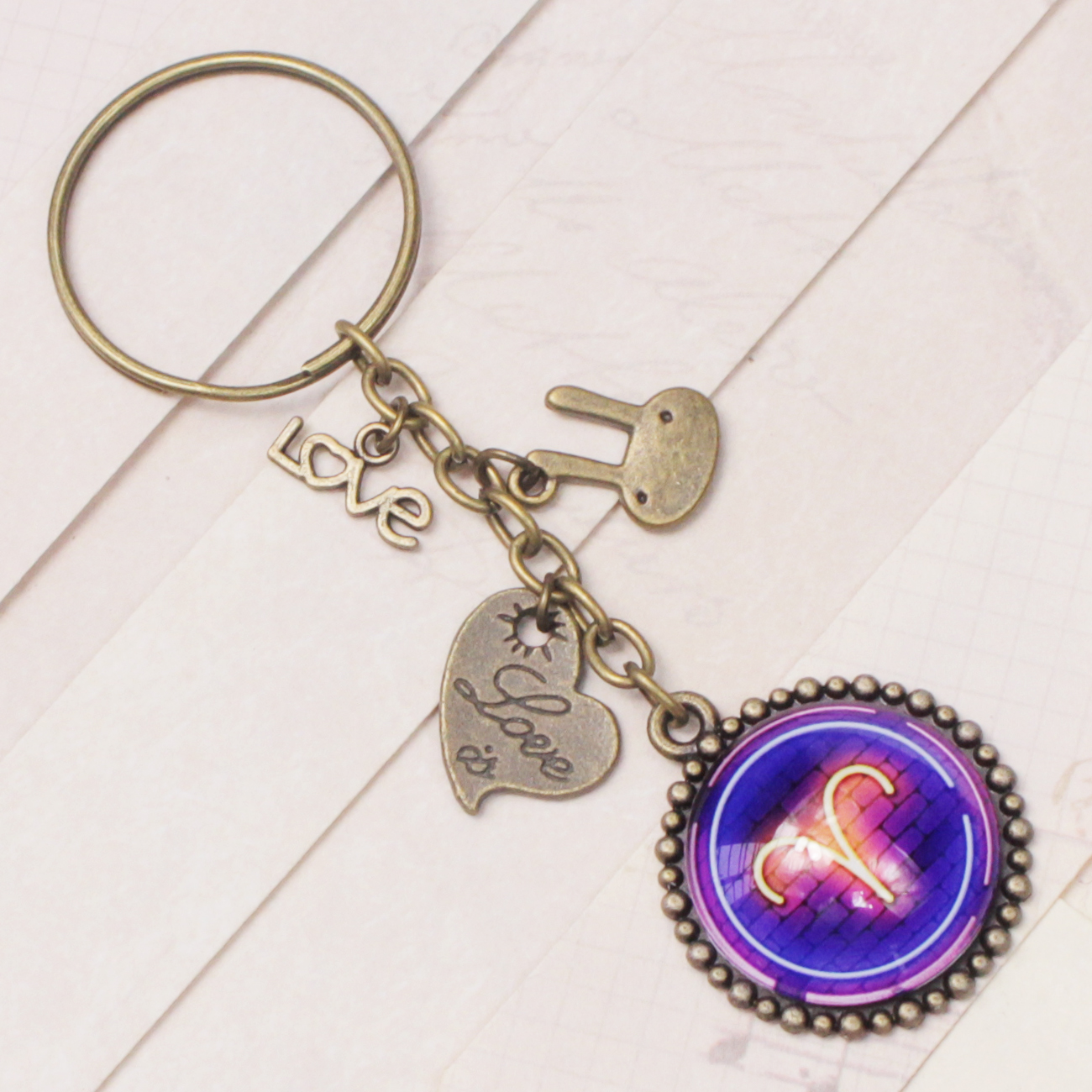Móc khóa 12 cung hoàng đạo Zodiac màu sắc tươi sáng ánh tím siêu đẹp 06646-MK0032