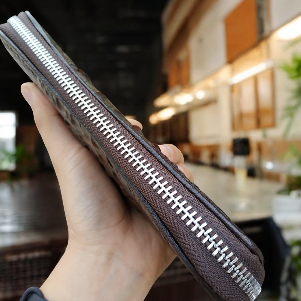 Ví cầm tay gai lưng cá sấu 1 khuôn rất đẹp