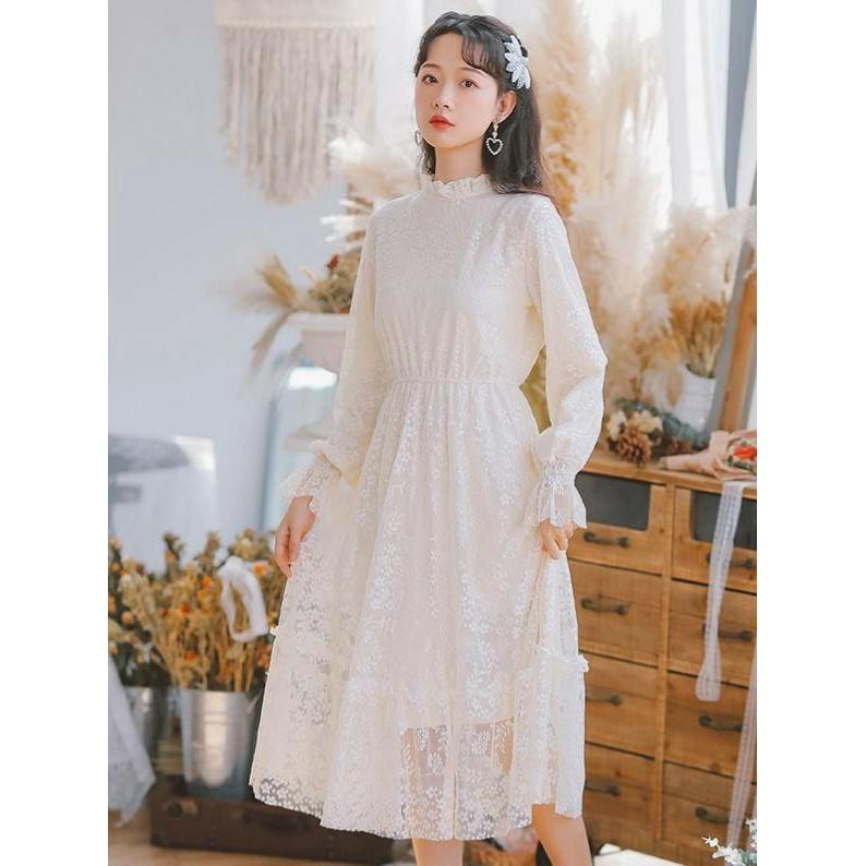 Đầm Ulzzang trắng chấm bi tay dài