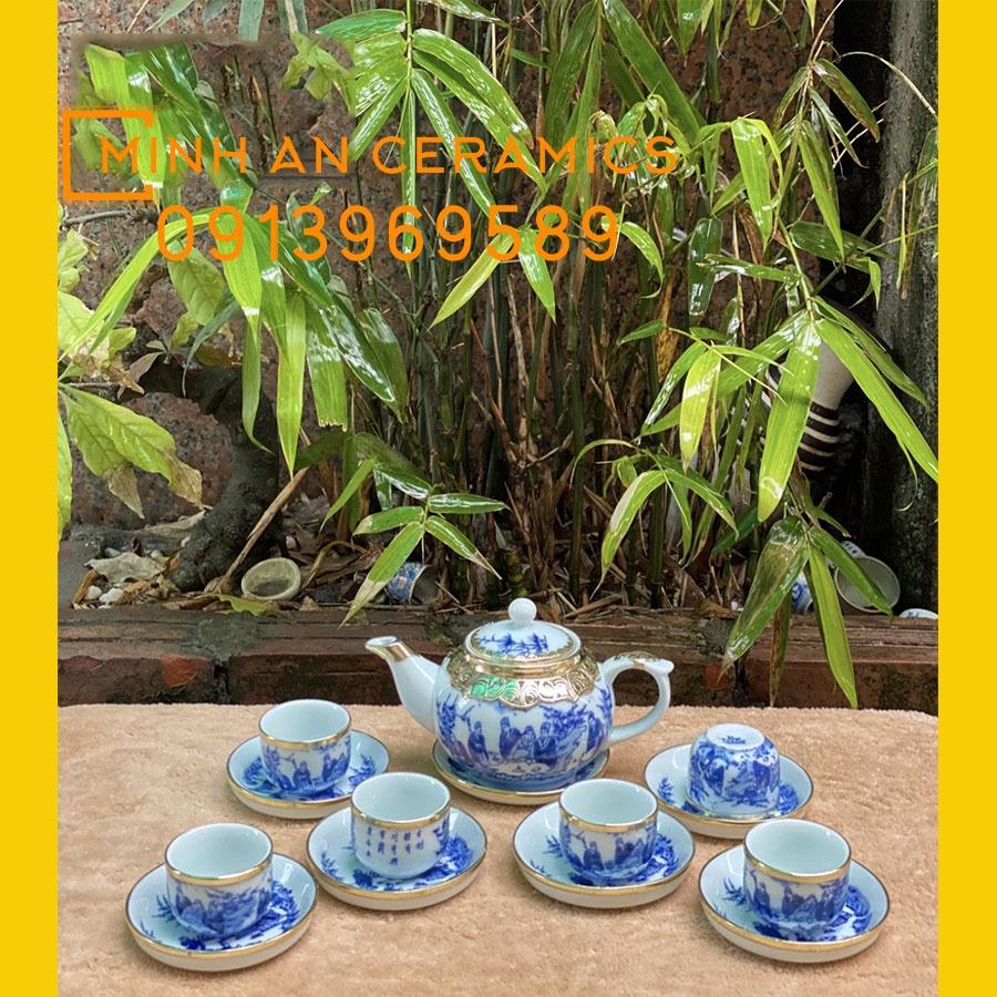 Bộ ấm trà gốm sứ Bát tràng men lam vẽ trúc lâm thất hiền bọc đồng vàng gốm Minh An Bát Tràng dáng ấm quả hồng