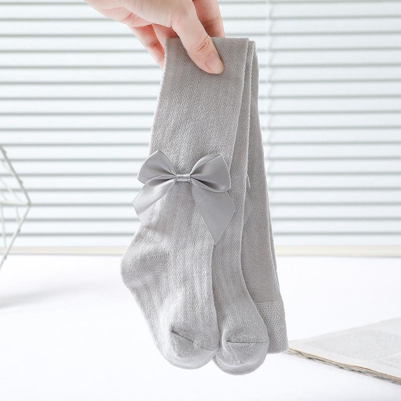 Quần tất lưới đính nơ cho bé gái, quần tất len mỏng co giãn 4 chiều, size từ 6 tháng đến 8 tuổi